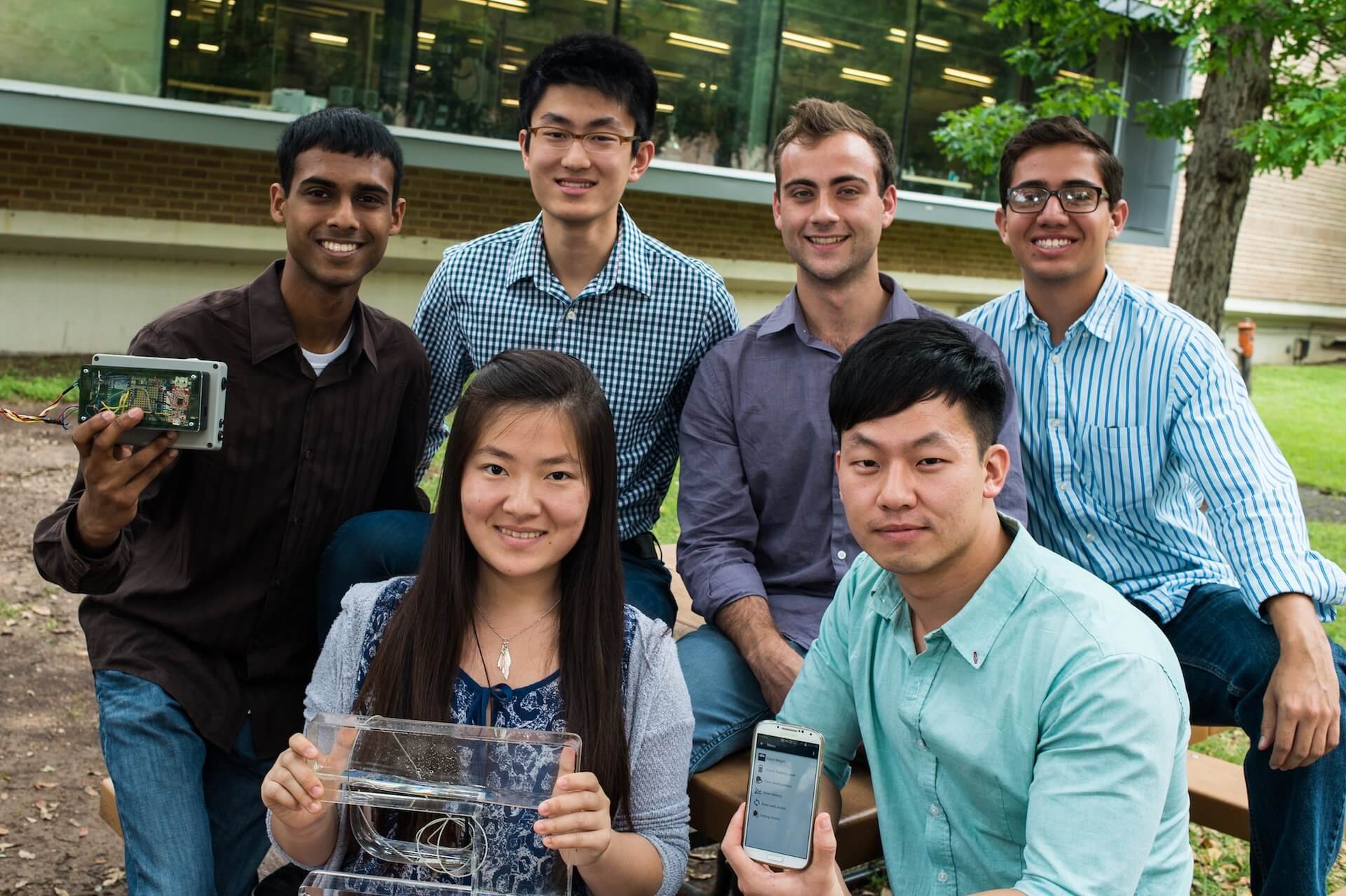 The Flowtastic team of Rice University engineering students created an app and hardware to help control a unique heart assist pump. Members are, standing from left, Navaneeth Ravindranath, Ernest Chan, Alex Bisberg and Benjamin Lopez, and seated, Tracy Fu and Joshua Choi. (Credit: Jeff Fitlow/Rice University)
