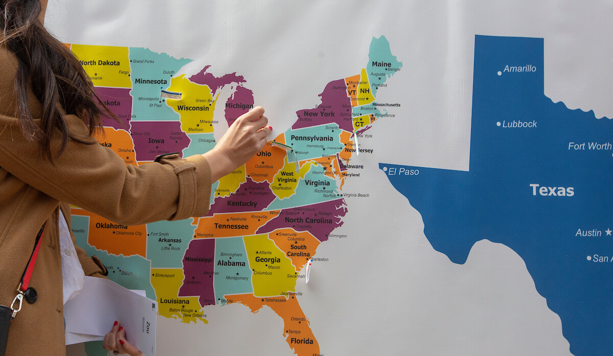 A student pins her location on a map during Match Day at Baylor College of Medicine on March 15, 2019.