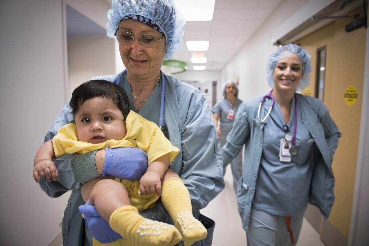 The first patient to undergo surgery at Legacy Tower is taken back to the state-of-the-art operating room (Credit: Paul Vincent Kuntz/Texas Children’s Hospital).