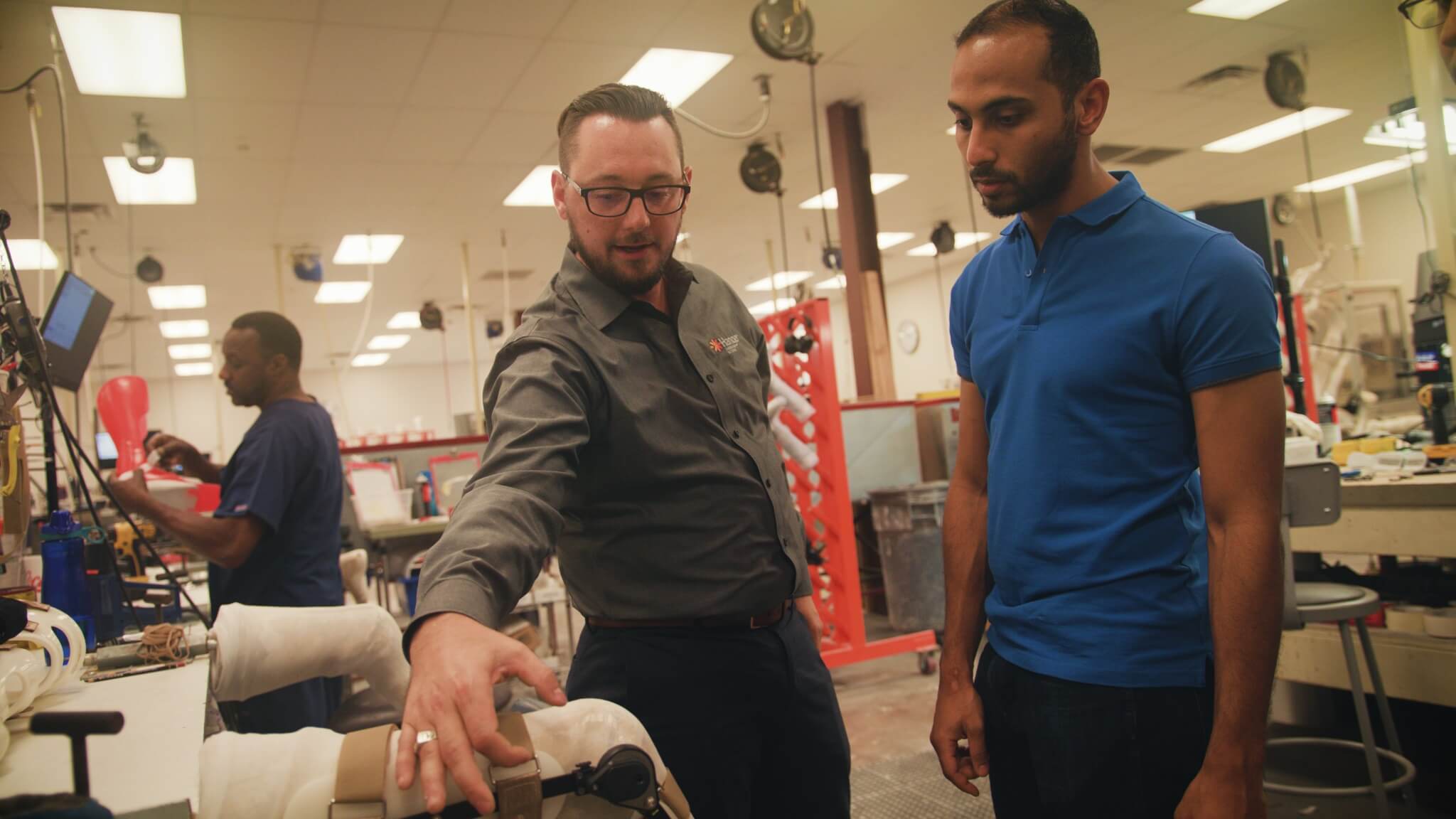 Hanger's Andrew Dibello, left, and AT&T's Mohamed Elmahdy in the Hanger Fabrication laboratory.