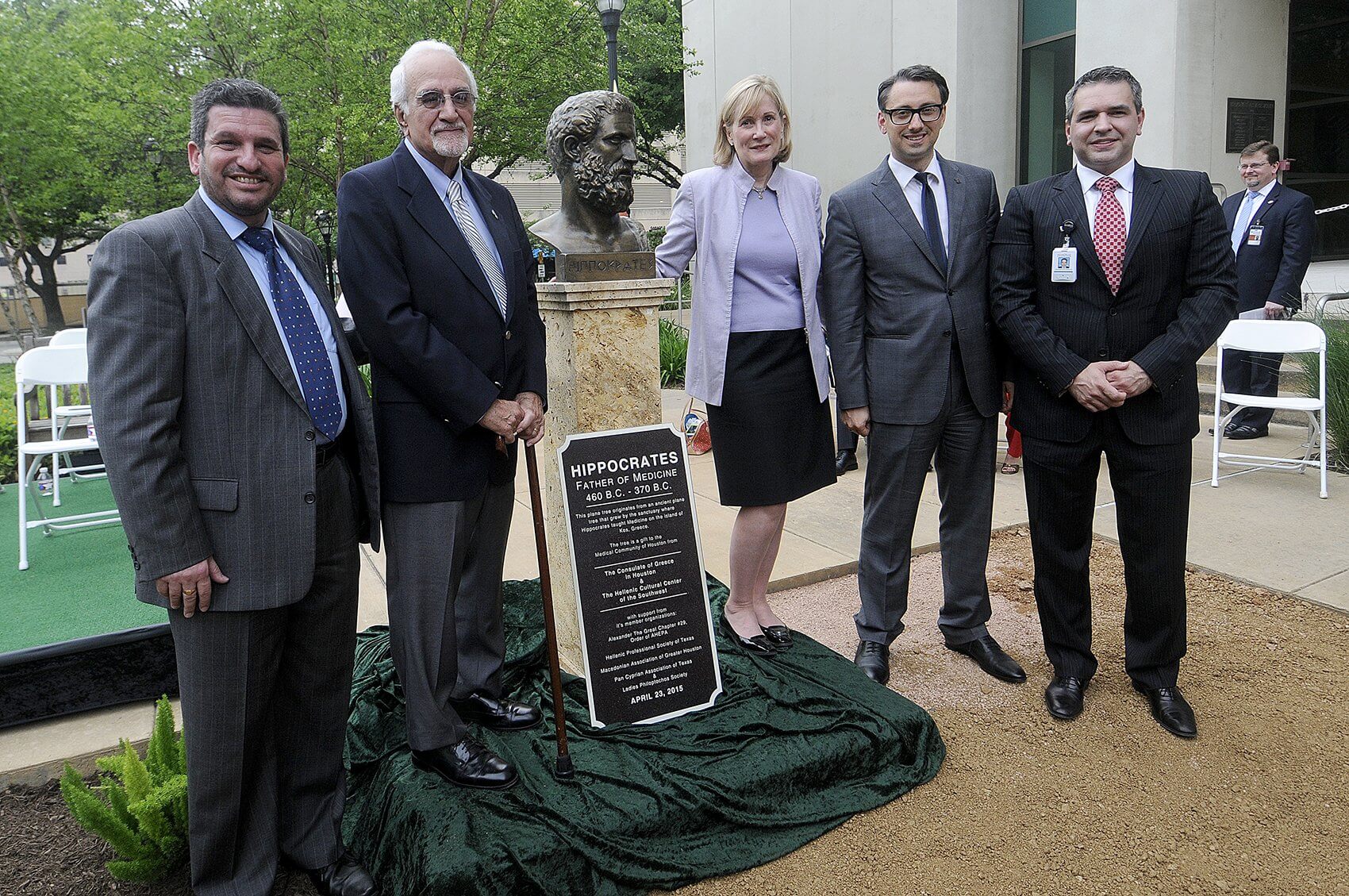 Representatives from the Hellenic Cultural Center of the Southwest, UTHealth and the Consulate of Greece in Houston stand next to the bronze bust of Hippocrates that was unveiled Thursday, April 23, at UTHealth Medical School. (Credit: Dwight Andrews, UTHealth Medical School Office of Communications)