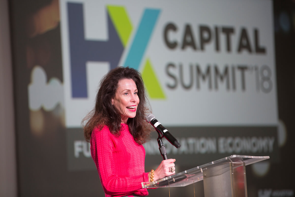 Gina Luna, CEO of Luna Strategies and Houston Exponential board chairman, greets attendees at the Houston Exponential Capital Summit on Dec. 4, 2018.