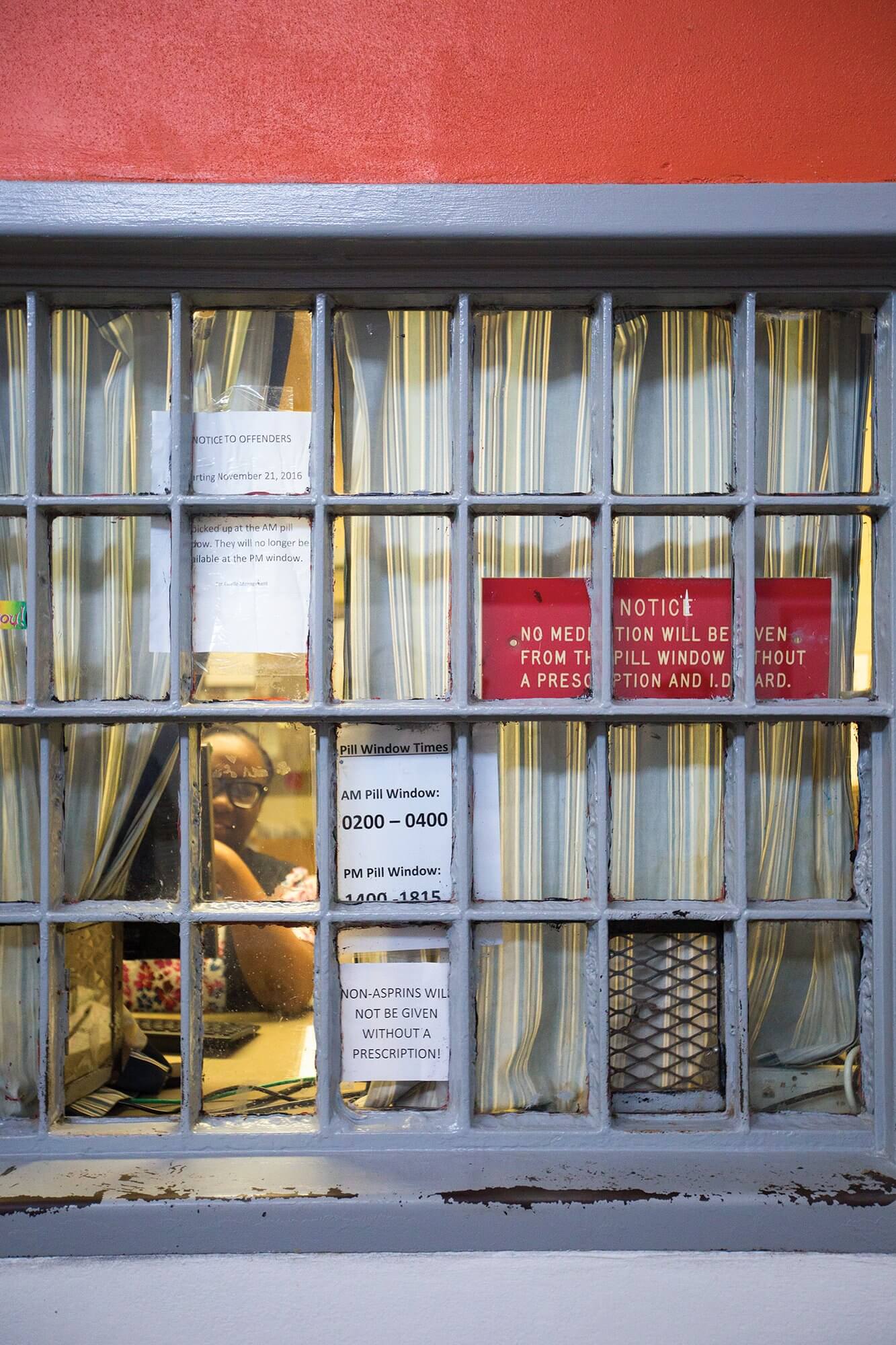 The pill window, where offenders are responsible for picking up their medications at a scheduled time each day.
