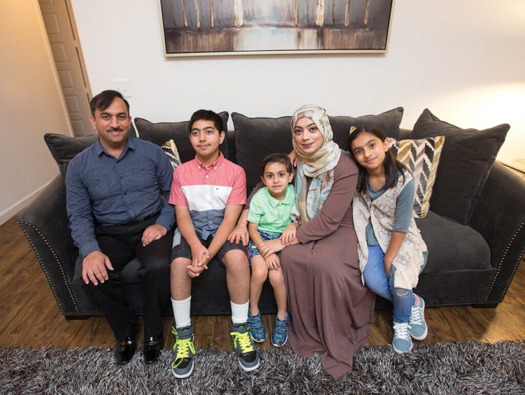 The Majeed family poses at home in Conroe, Texas, from left to right: Ashif, Umair, Ayan, Bushra and Sara.