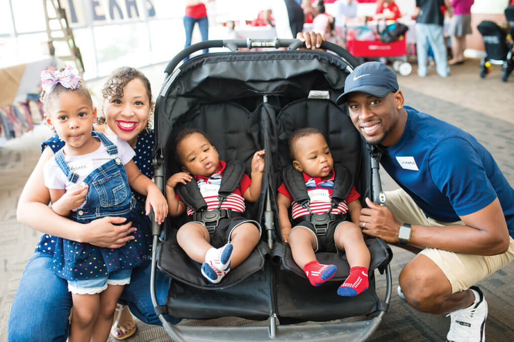 DEMARCUS AND SADÉ KELLY, with their children Ariana, Jacob and Hosiah, were among the families who attended a “Made in Texas” themed neonatal intensive care unit (NICU) reunion on Aug. 4, where they were reunited with TEXAS CHILDREN’S HOSPITAL doctors, nurses and other staff who cared for them. The reunion celebrated former patients who graduated from the Newborn Center in 2017 (Credit: CJ Martin).