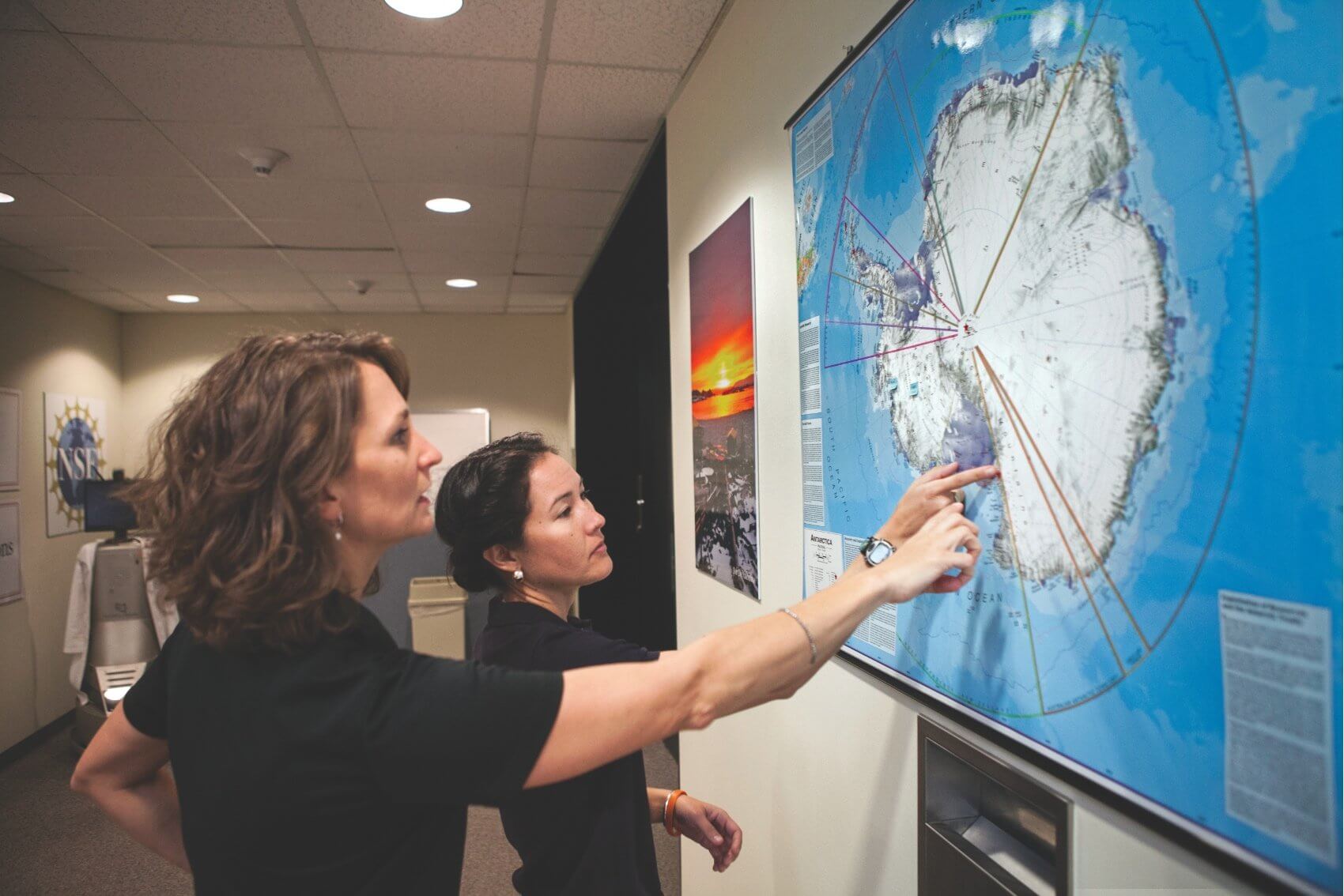 Tarah Castleberry, DO, MPH, and Natacha Chough, M.D., MPH, identify McMurdo Station—a U.S. Antarctic research center located on the southern tip of Ross Island.