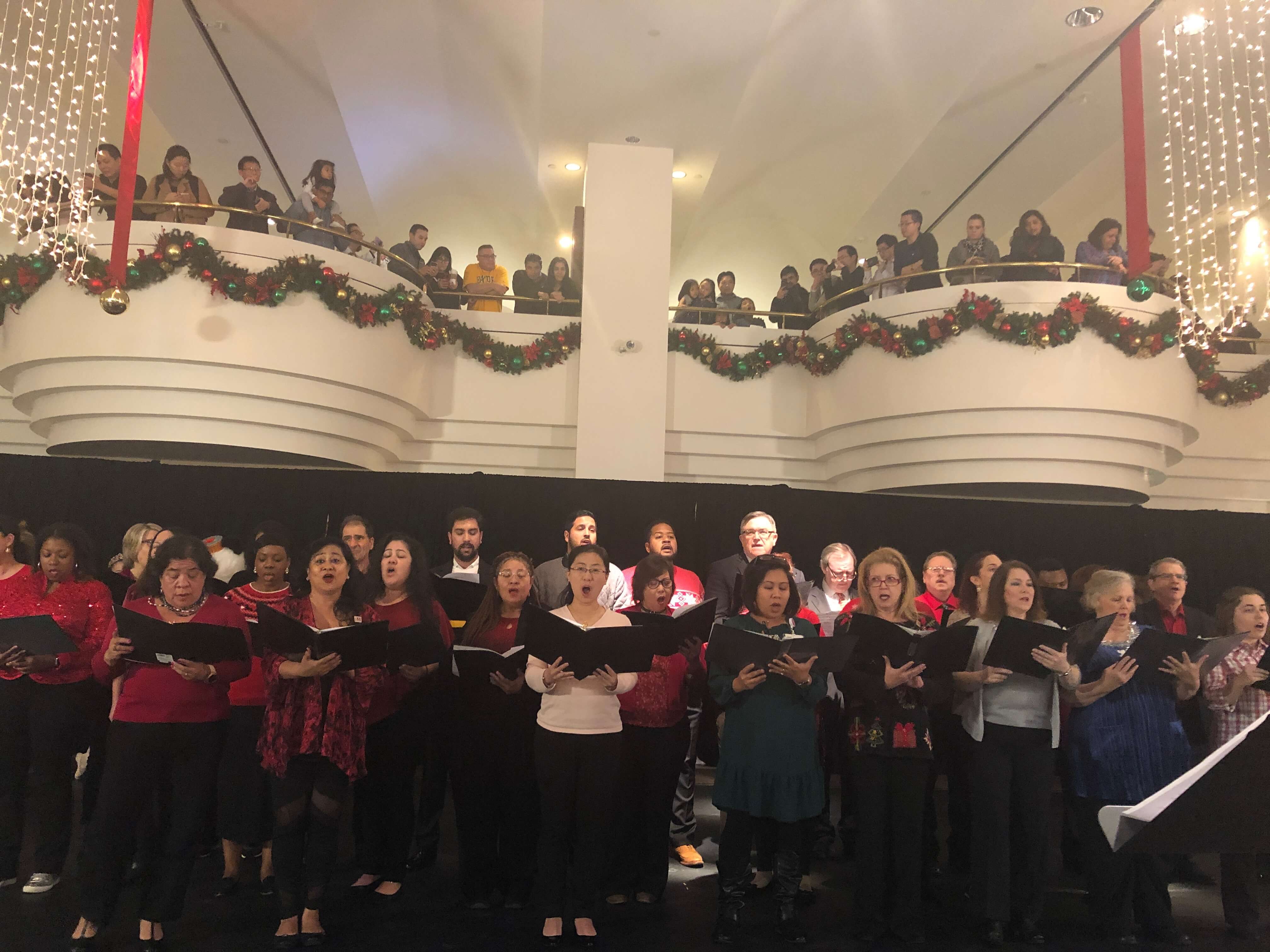 Members of the Houston Methodist Choir sing Christmas carols.