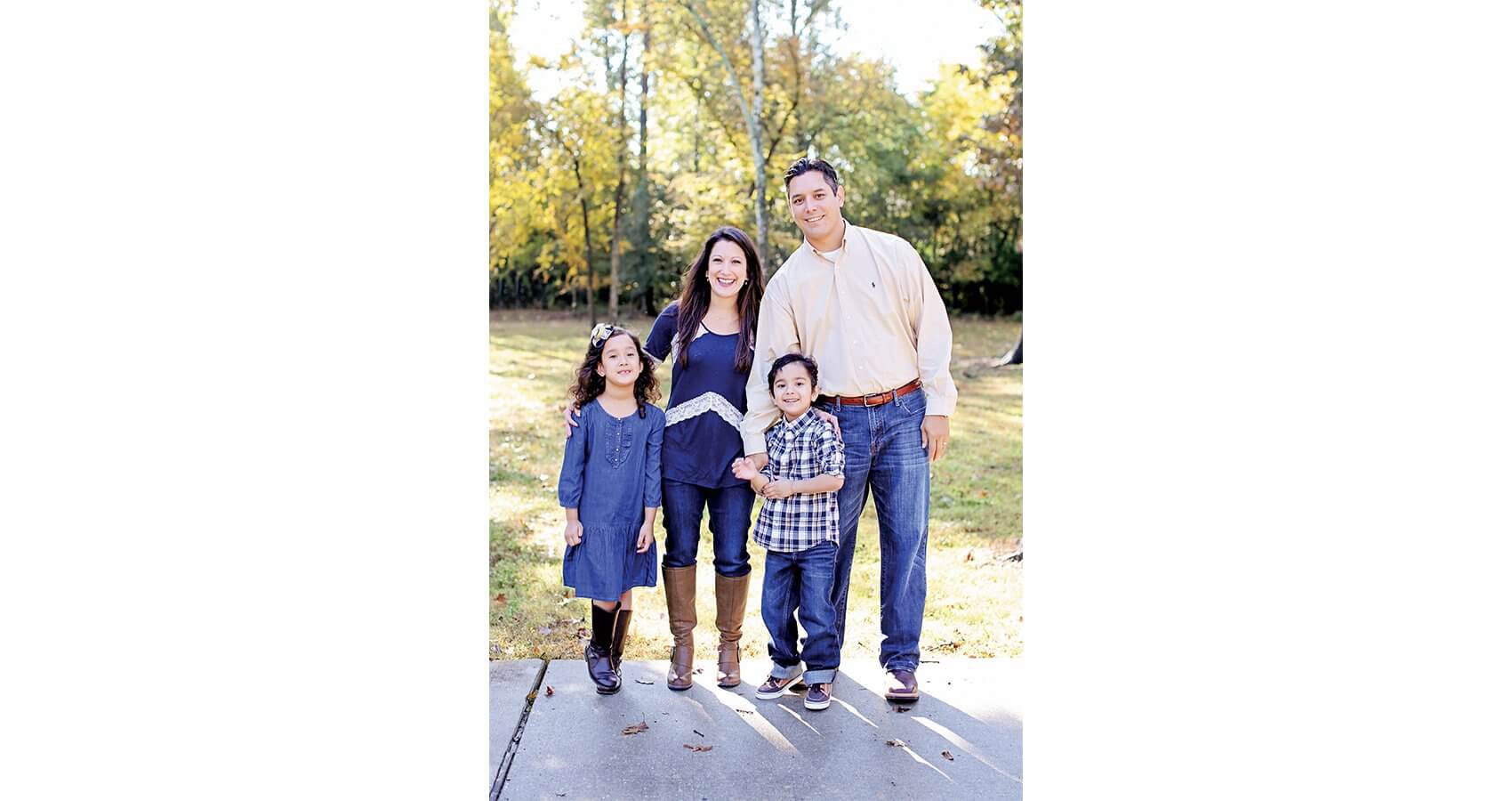 Ruth Ann Luna, Ph.D., is pictured with her family. She hopes results from this study will benefit patients like her son, a six-year-old with autism who has limited verbal abilities and also suffers from GI problems. (Credit: Lindsay Moore)