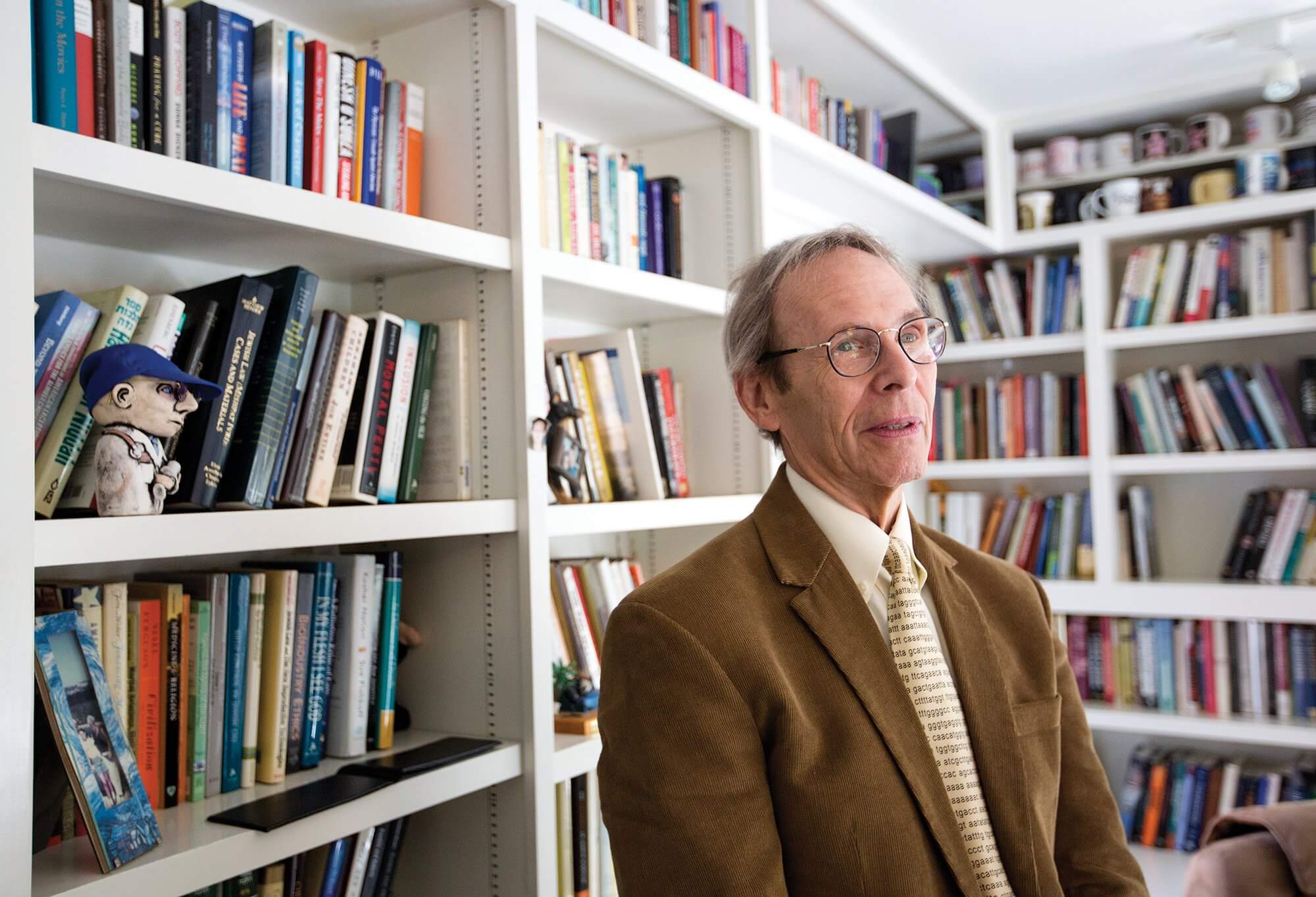 Sheldon Rubenfeld, M.D., director of the Center for Medicine After the Holocaust at his home library.