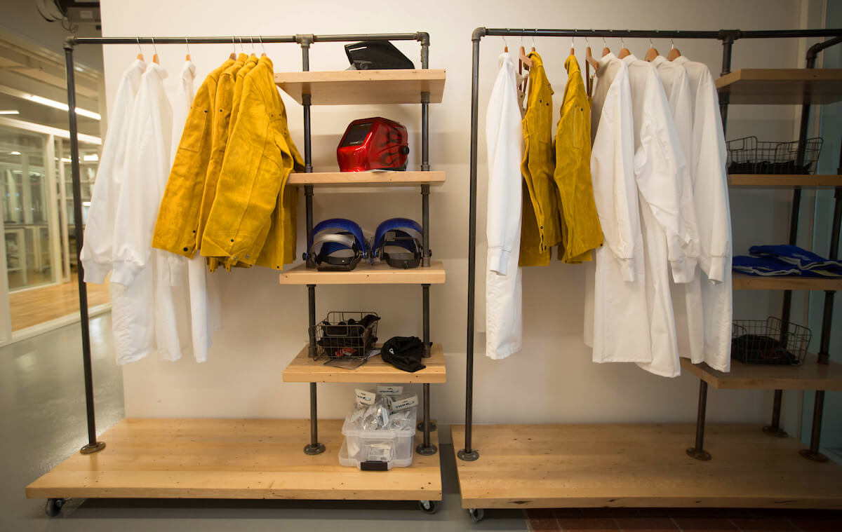 Welding jackets, helmets and lab coats are stored on a rack at the Center for Device Innovation (CDI @ TMC), a collaboration between Johnson & Johnson Medical Devices Companies, Johnson & Johnson Innovation and the Texas Medical Center.