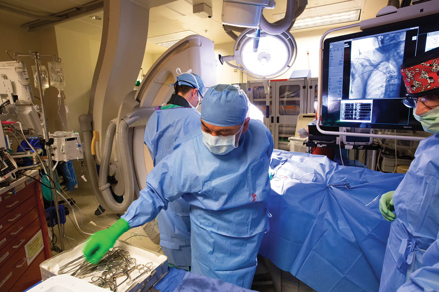 Cardiologist Hamid Afshar, M.D., center, implants the remedē system in a patient at the Michael E. DeBakey VA Medical Center.