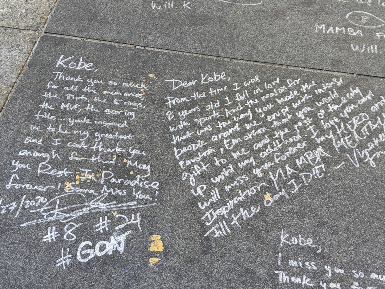 Fans wrote personal messages to share what late Los Angeles Lakers star Kobe Bryant meant to them on a sidewalk memorial. (Photo Courtesy of Erica Jousan)