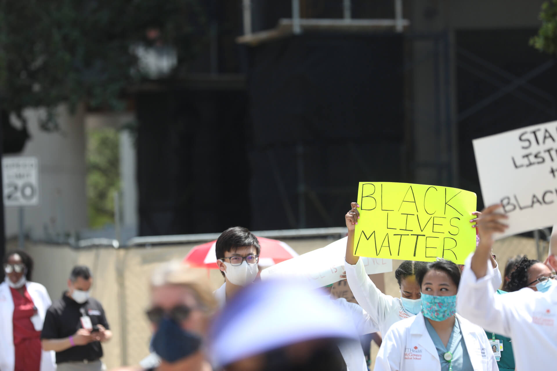 Texas Medical Center health professionals participate in a walking vigil for black lives on Tuesday, June 9, 2020.