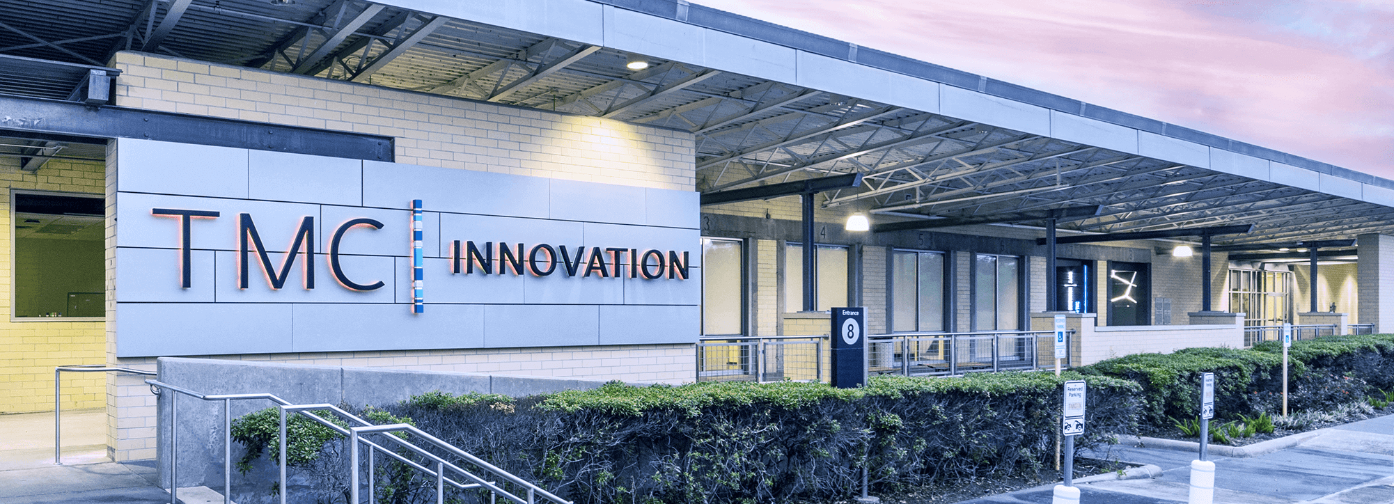 TMC Innovation sign in front of their leasing building.